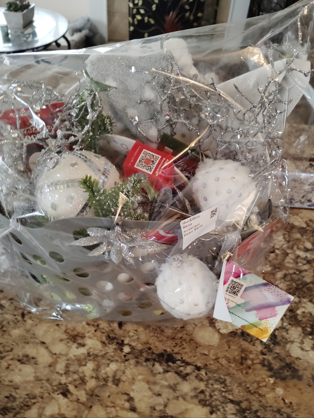 Silver and white festive Christmas holiday themed gift basket